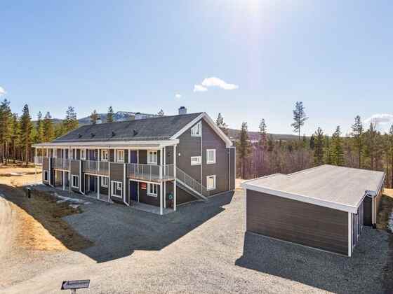 Six-Apartment Residence