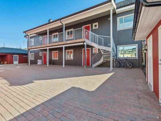 Four-Apartment Residence